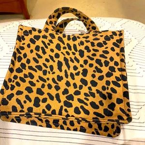 Adorable soft animal print purse. Like new.